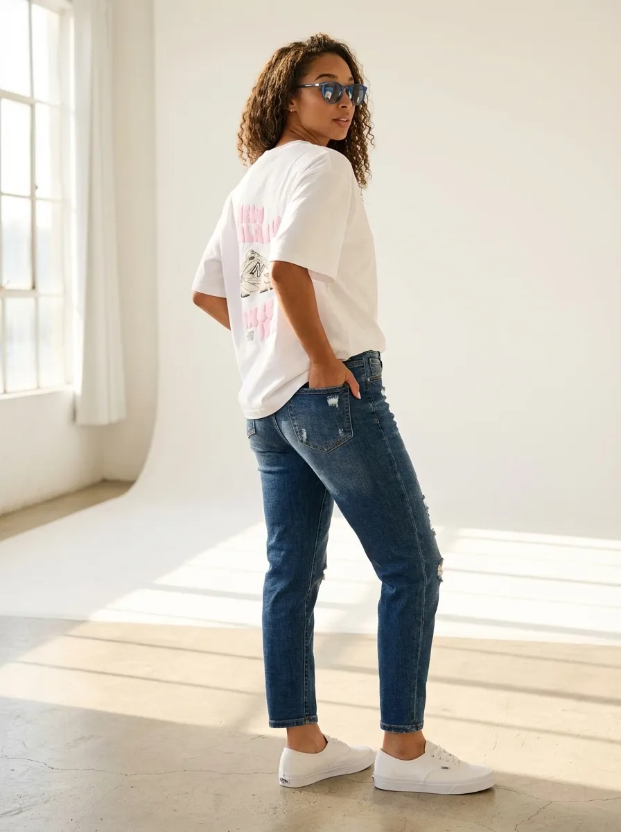 Effortless Cool: Distressed Denim & Classic Kicks